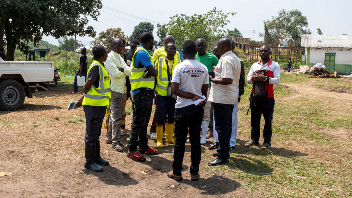 Healthcare workers involved in the Ebola response gather at Rwampara General Hospital during a go-slow over unpaid salaries, as authorities seek to contain a new outbreak of the Bundibugyo strain of Ebola, in Rwampara, Ituri province, Democratic Republic of Congo, July 6, 2026. REUTERS/Gradel Muyisa Mumbere