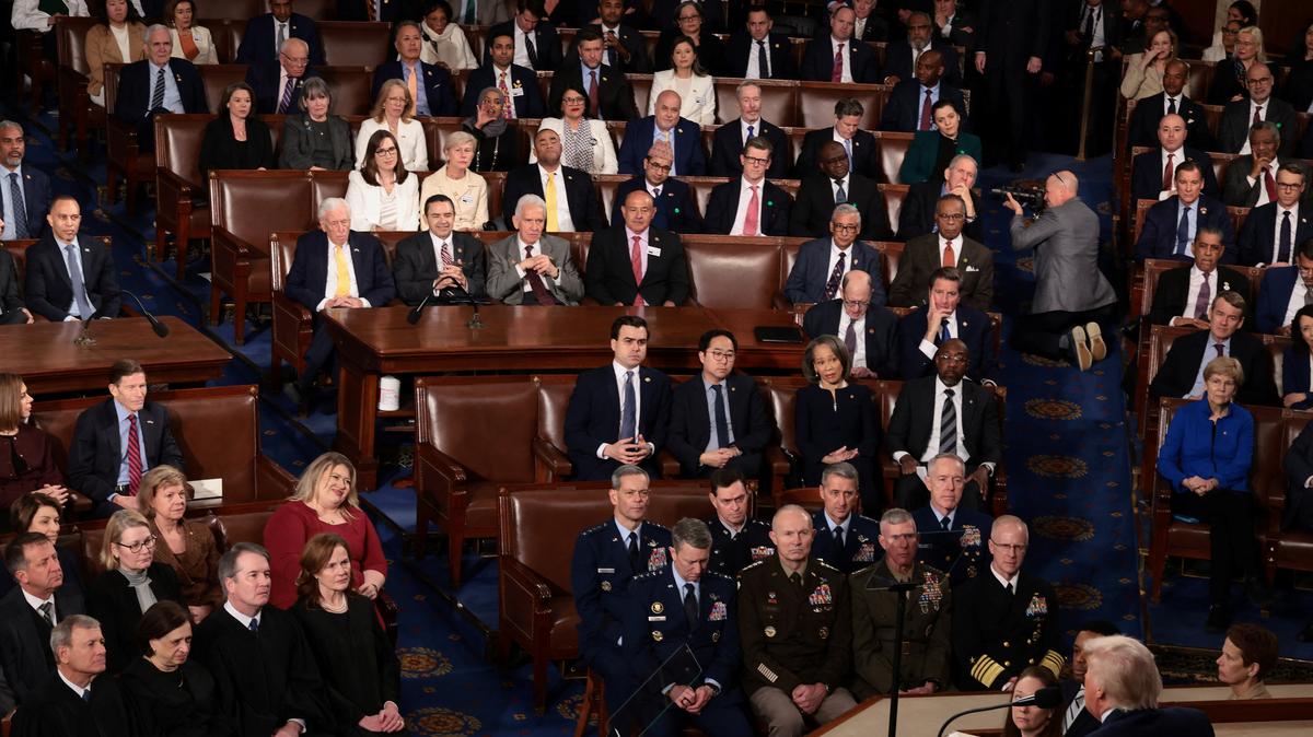 Chief Justice of the U.S. Supreme Court John Roberts, U.S. Supreme Court Justice Elena Kagan, U.S. Supreme Court Justice Brett M. Kavanaugh, U.S. Supreme Court Justice Amy Coney Barrett and Chairman of the Joint Chiefs of Staff General Dan Caine attend U.S. President Donald Trump's State of the Union address to a joint session of Congress at the U.S. Capitol in Washington, D.C., U.S., February 24, 2026.  REUTERS/Evelyn Hockstein