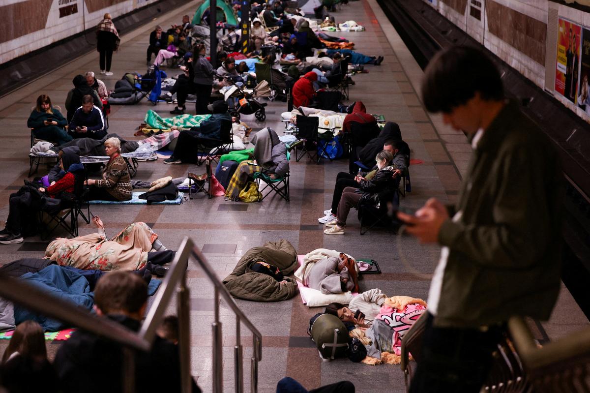 People take shelter inside a metro station during a Russian missile and drone strike, amid Russia's attack on Ukraine, in Kyiv, Ukraine May 24, 2026. REUTERS/Alina Smutko