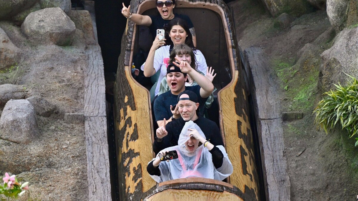 Riders from the first virtual queue group react head down the falls on Tiana’s Bayou Adventure at Disneyland in Anaheim, CA, on Monday, Oct. 21, 2024. Tiana’s Bayou Adventure is a log flume ride based on Disney’s 2009 film The Princess and the Frog. The ride used to be the Splash Mountain attraction themed to Disney’s 1946 film Song of the South. ..(Photo by Jeff Gritchen, Orange County Register/SCNG)