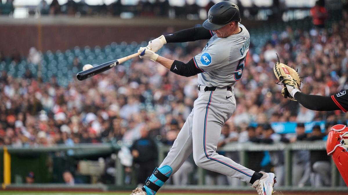 Aug 31, 2024; San Francisco, California, USA; Miami Marlins outfielder Griffin Conine (56) hits a two-run home run against the San Francisco Giants during the second inning at Oracle Park. Mandatory Credit: Robert Edwards-USA TODAY Sports