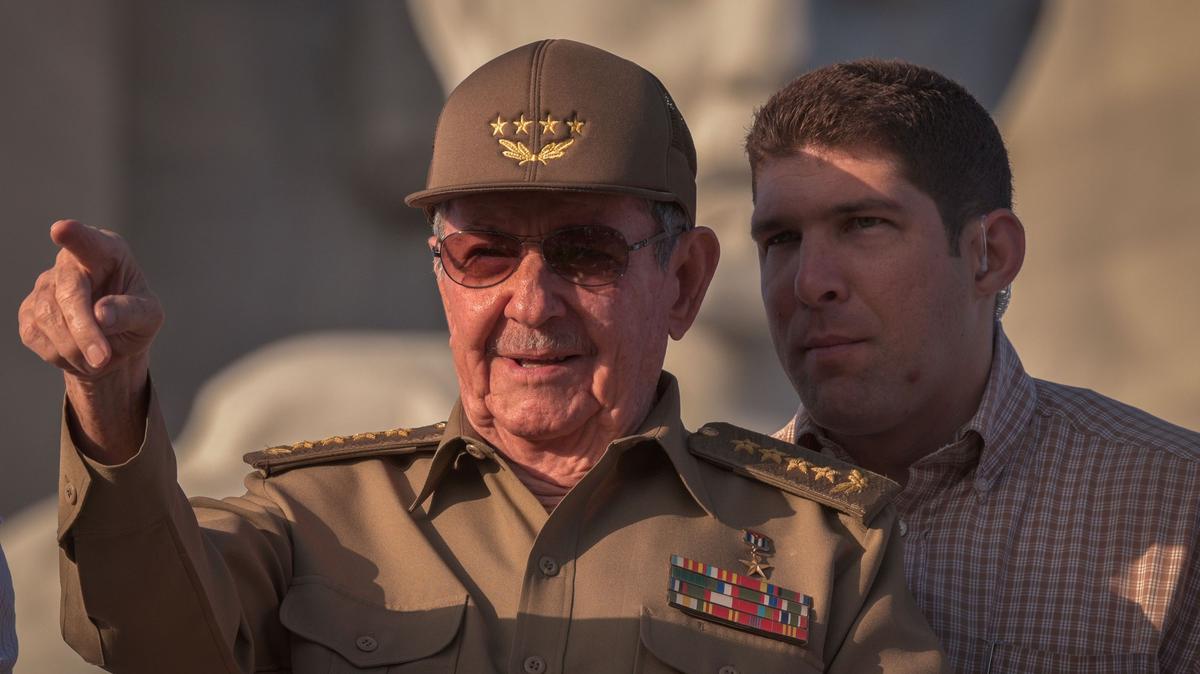 Cuban President Raul Castro, next to his grandson and bodyguard, Raul Rodriguez Castro, during the May Day parade at Revolution Square of Havana, on May 1, 2017. (Adalberto Roque/AFP/Getty Images/TNS)