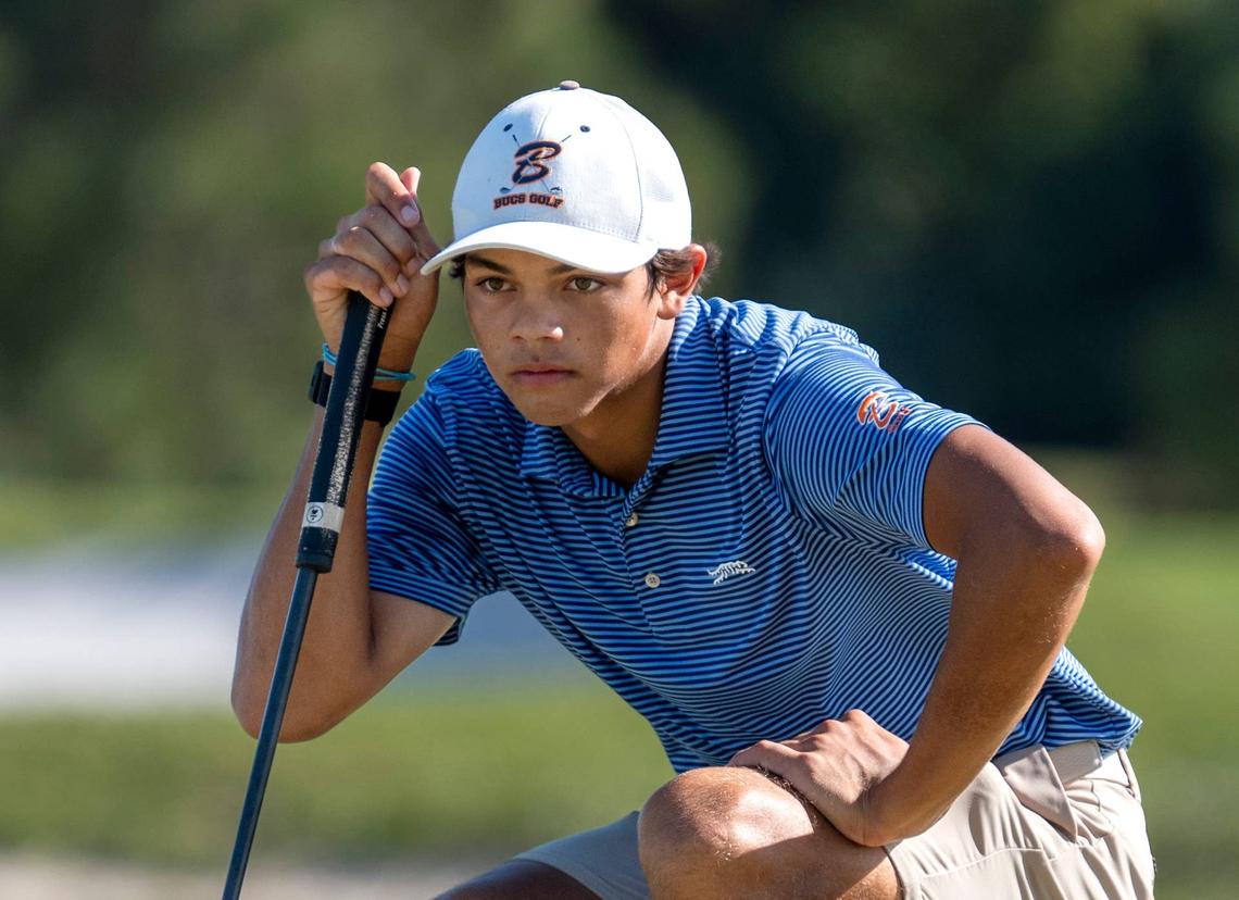  Benjamin School golfer Charlie Woods reads the green during the Region 4-1A boys golf championship at The Park on November 3, 2025, in West Palm Beach, Florida. 