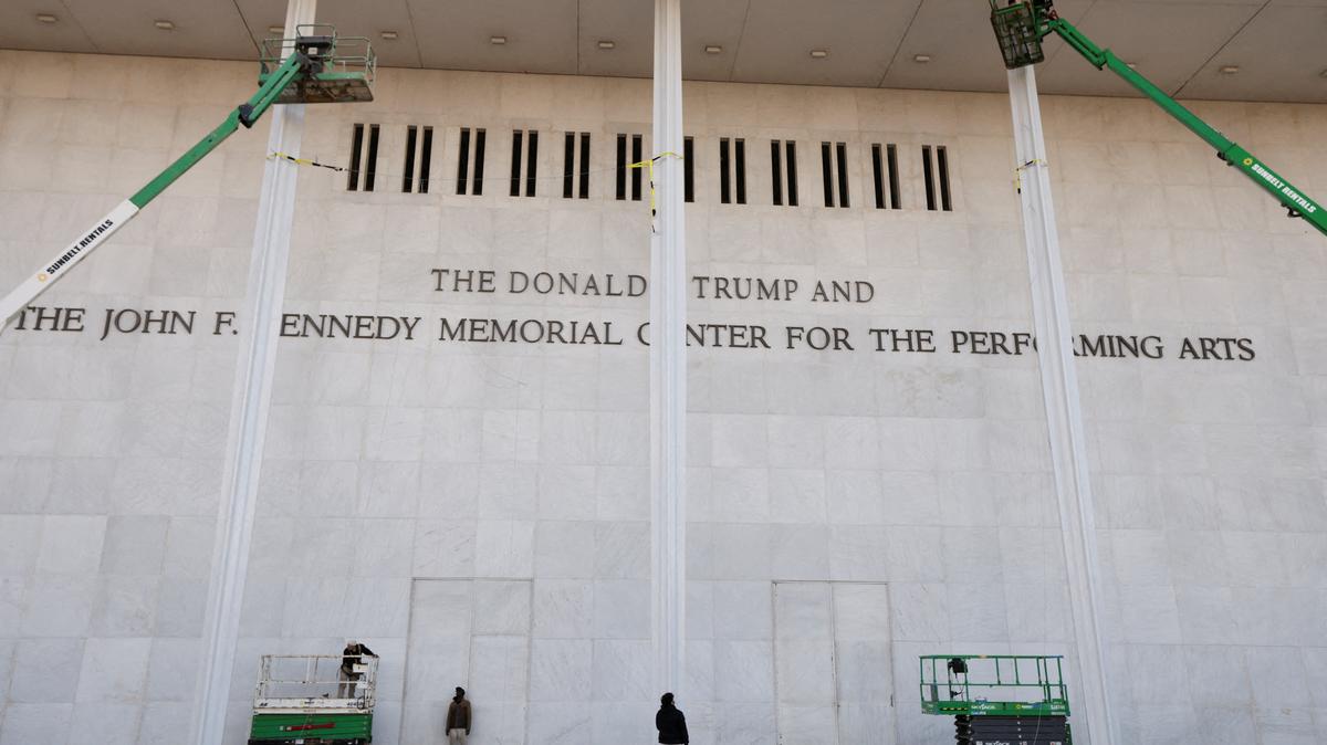 The newly added lettering for U.S. President Donald Trump's name is displayed at the facade of the John F. Kennedy Center for the Performing Arts, a day after its board announced it would rename the institution The Donald J. Trump and The John F. Kennedy Memorial Center for the Performing Arts, in Washington, D.C., U.S., December 19, 2025. REUTERS/Kevin Lamarque