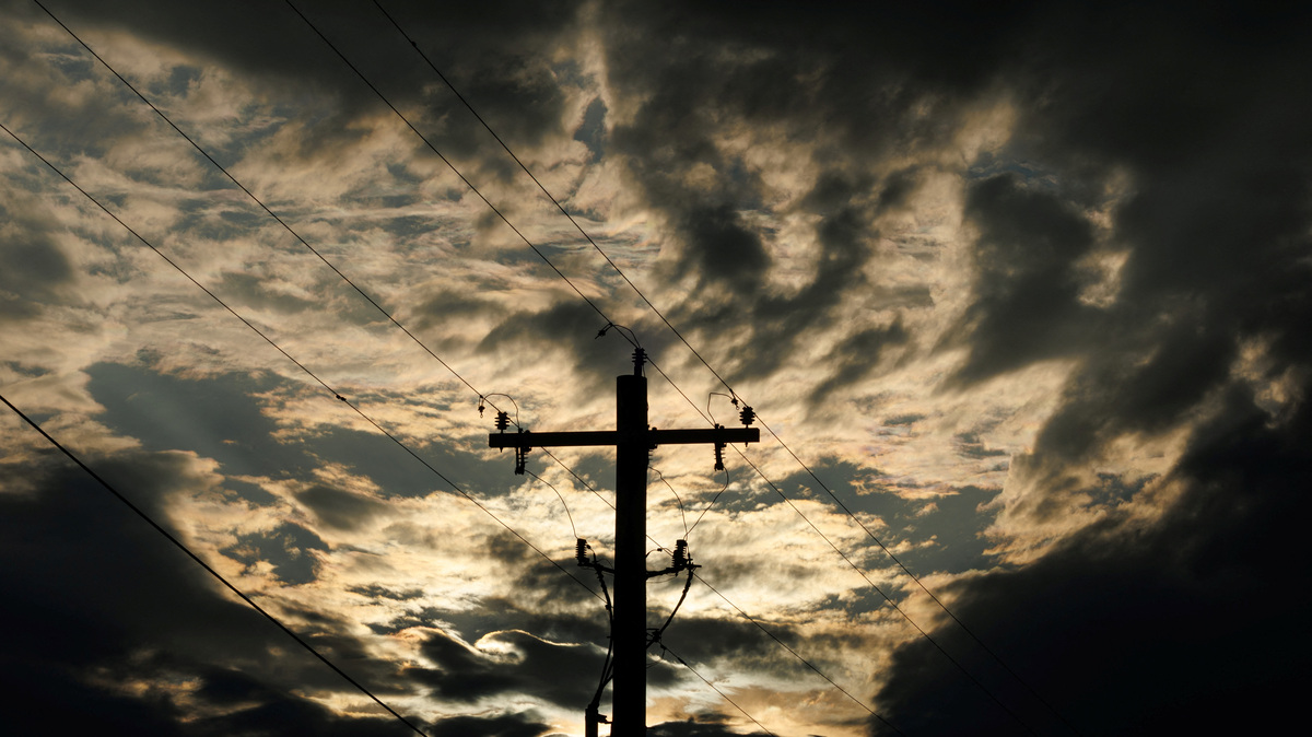 Electrical power lines are shown during a storm in Anson, Texas, U.S., April 24, 2025. REUTERS/Mike Blake