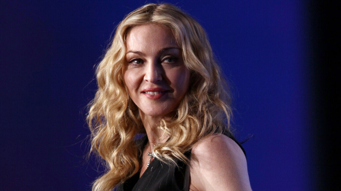 Madonna Owns a Dozen Perfumes -This Deep Rose Is Her 'Main' 1 