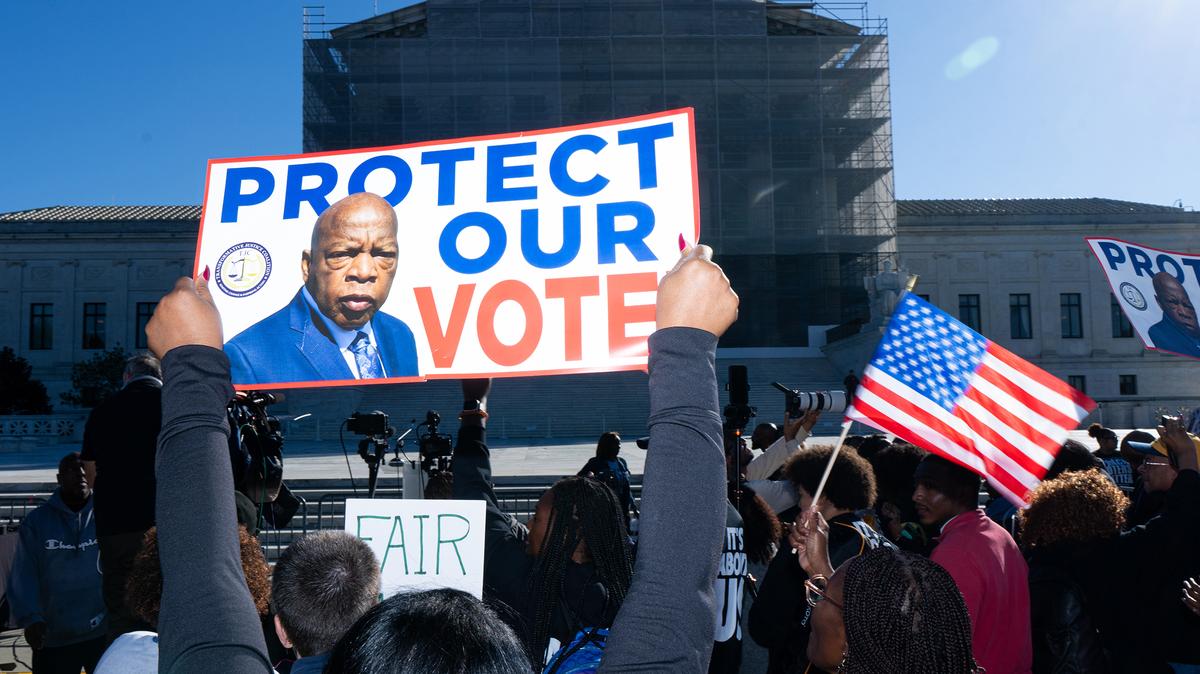 Voting rights activists protest on Wednesday, Oct. 15, 2025, outside the Supreme Court in Washington as the court prepares to hear arguments in a case challenging Louisiana's congressional map. (Bill Clark/CQ Roll Call via ZUMA Press/TNS)