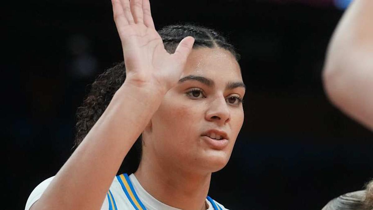  UCLA Bruins center Lauren Betts (51) celebrates with teammates during their 79-51 win over the South Carolina Gamecocks to claim the NCAA women's basketball national championship at Mortgage Matchup Center in Phoenix on April 5, 2026. | Joe Rondone/The Republic / USA TODAY NETWORK via Imagn Images 