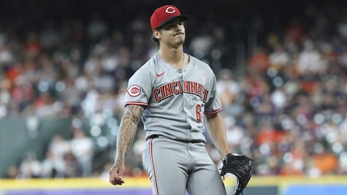  May 11, 2025; Houston, Texas, USA; Cincinnati Reds starting pitcher Chase Petty (61) reacts after a pitch during the second inning against the Houston Astros at Daikin Park. | Troy Taormina-Imagn Images 