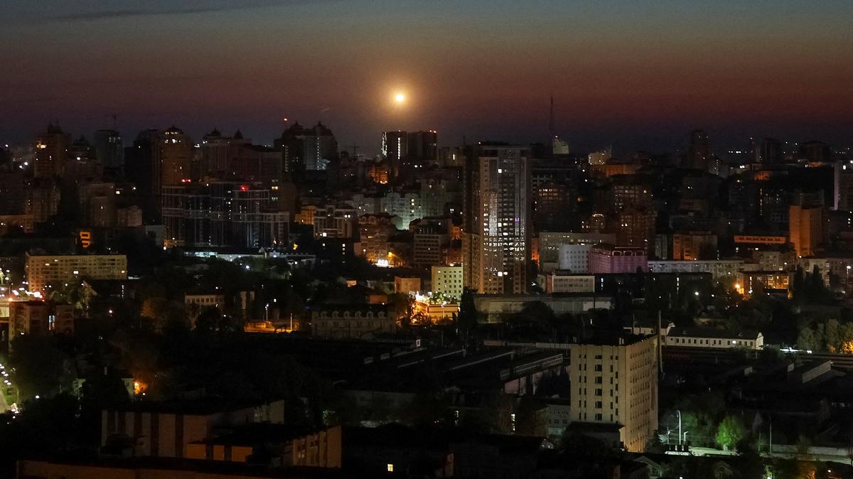 An explosion over the city as Ukrainian servicemen hit a Russian drone during a Russian drone strike, amid Russia's attack on Ukraine, in Kyiv, Ukraine May 12, 2026. REUTERS/Gleb Garanich