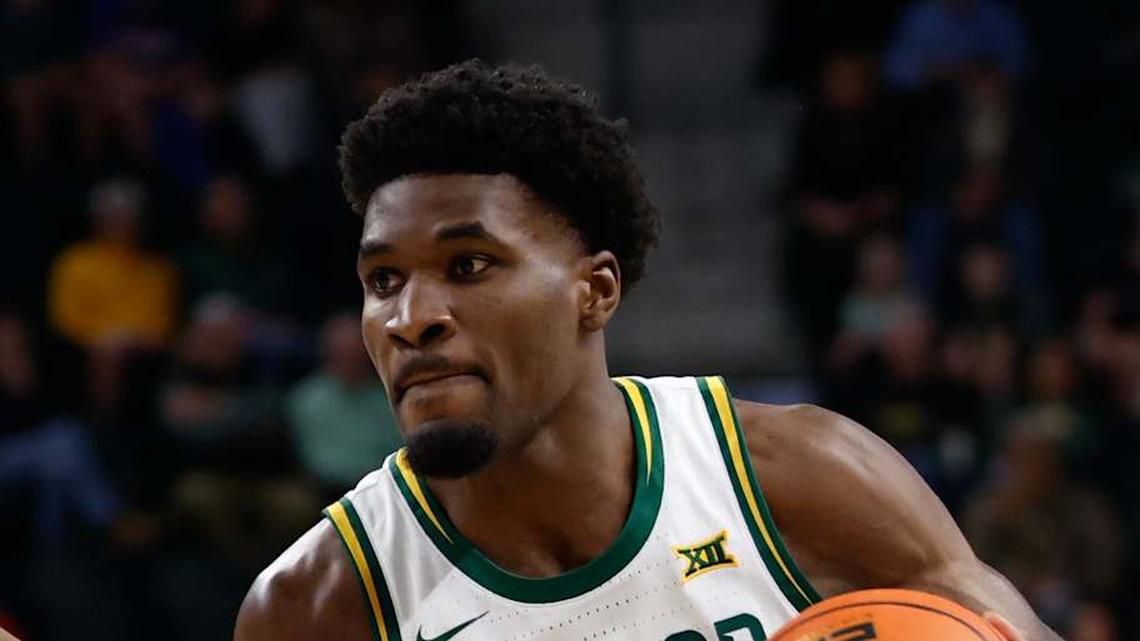  Feb 24, 2026; Waco, Texas, USA; Baylor Bears guard Tounde Yessoufou (24) drives to the basket against Arizona Wildcats forward Tobe Awaka (30) during the first half at Paul and Alejandra Foster Pavilion. Mandatory Credit: Chris Jones-Imagn Images | Chris Jones-Imagn Images 