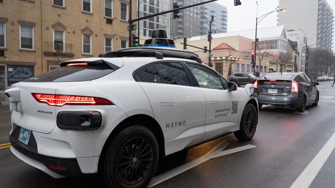 A Waymo test vehicle is driven along North Lasalle Drive in the River North neighborhood on March 4, 2026. (Peter Tsai/Chicago Tribune/TNS)