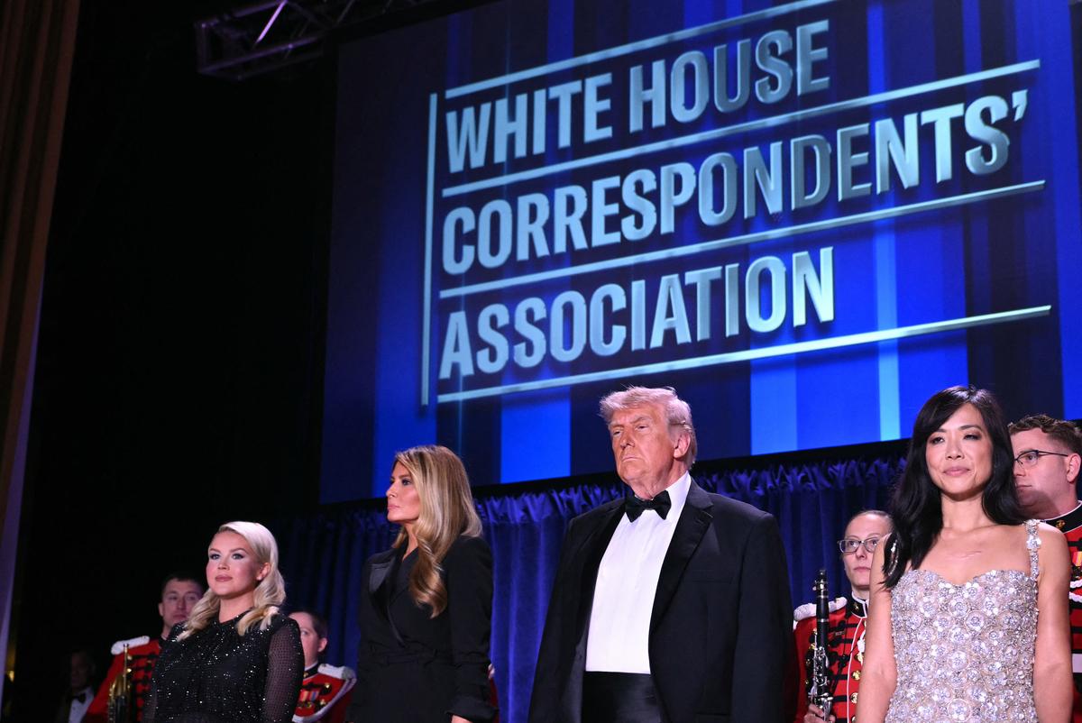  White House Press Secretary Karoline Leavitt, US First Lady Melania Trump, US President Donald Trump and CBS News senior White House correspondent Weijia Jiang attend the White House Correspondents’ dinner at the Washington Hilton in Washington, DC, on April 25, 2026. 
