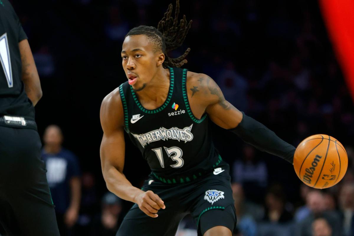  Minnesota Timberwolves guard Ayo Dosunmu (13) brings the ball up court. Bruce Kluckhohn-Imagn Images