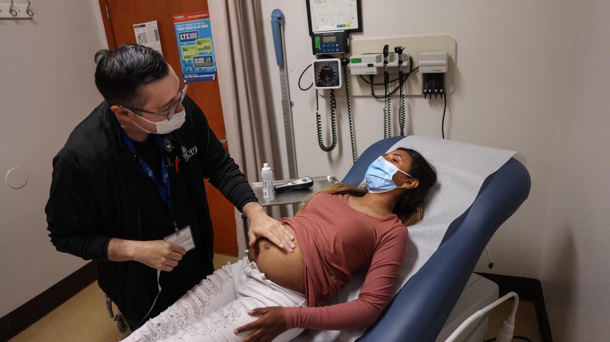 Dr. Armando Moreno has a prenatal visit with Andrea Lopez Hernandez, at the Clinica de Salud del Valle de Salinas on Wednesday, Sept. 27, 2023. If ACA enhanced premium tax credits lapse, federally qualified health centers could face overwhelming patient demand, funding losses and worsening care.