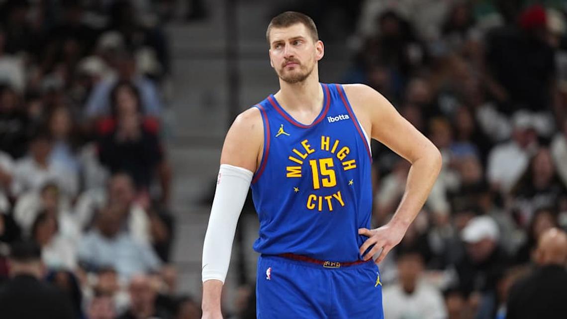  Apr 12, 2026; San Antonio, Texas, USA; Denver Nuggets center Nikola Jokic (15) awaits the start of a game against the San Antonio Spurs at Frost Bank Center. | Scott Wachter-Imagn Images 