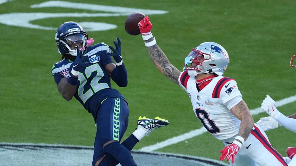  Feb 8, 2026; Santa Clara, CA, USA; New England Patriots cornerback Christian Gonzalez (0) breaks up a pass intended for Seattle Seahawks wide receiver Rashid Shaheed (22) in the first half in Super Bowl LX at Levi's Stadium. Mandatory Credit: Kirby Lee-Imagn Images | Kirby Lee-Imagn Images 
