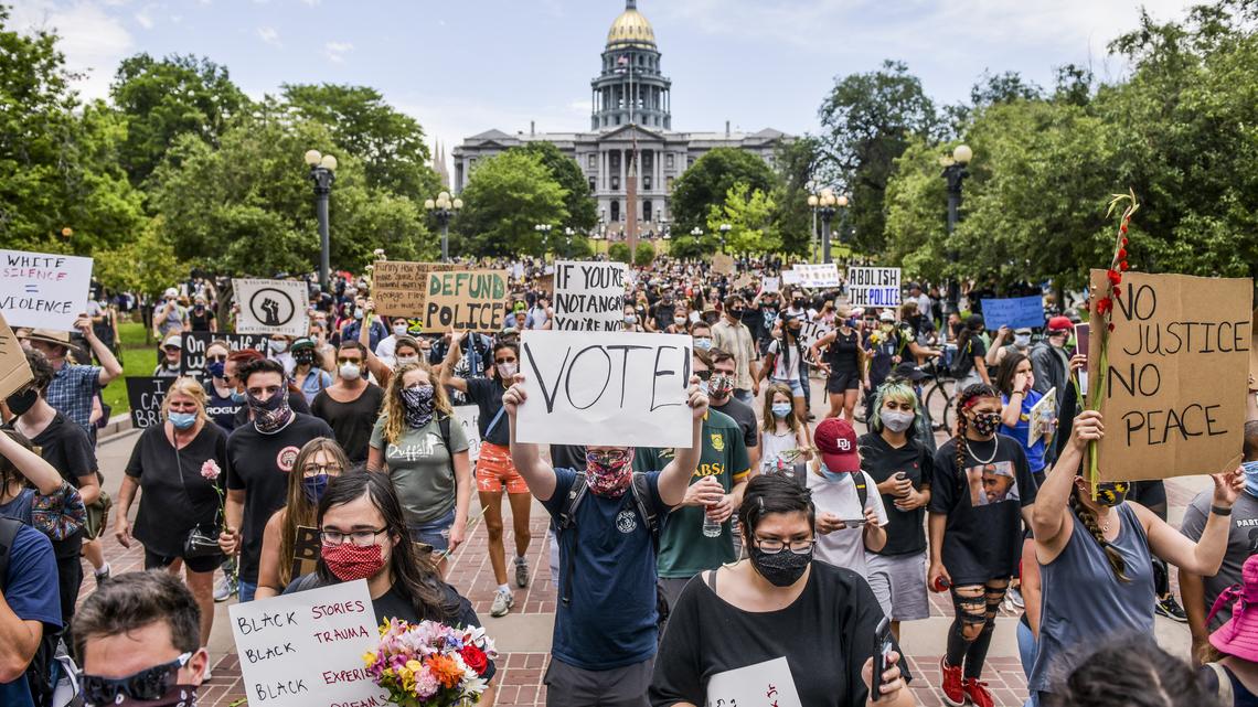 People protest next to the Colorado State Capitol on June 6, 2020, in Denver, Colorado. (Michael Ciaglo/Getty Images/TNS)
