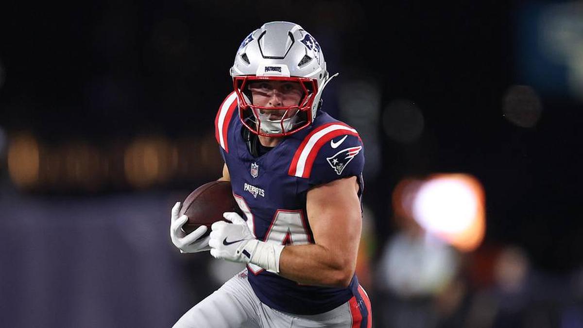 Aug 8, 2025; Foxborough, Massachusetts, USA; New England Patriots running back Lan Larison (34) runs the ball during the second half against the Washington Commanders at Gillette Stadium. Mandatory Credit: Paul Rutherford-Imagn Images | Paul Rutherford-Imagn Images 