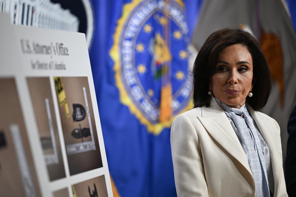  US Attorney for the District of Columbia Jeanine Pirro looks on during a news conference at Department of Justice headquarters in Washington, DC, on April 27, 2026. 