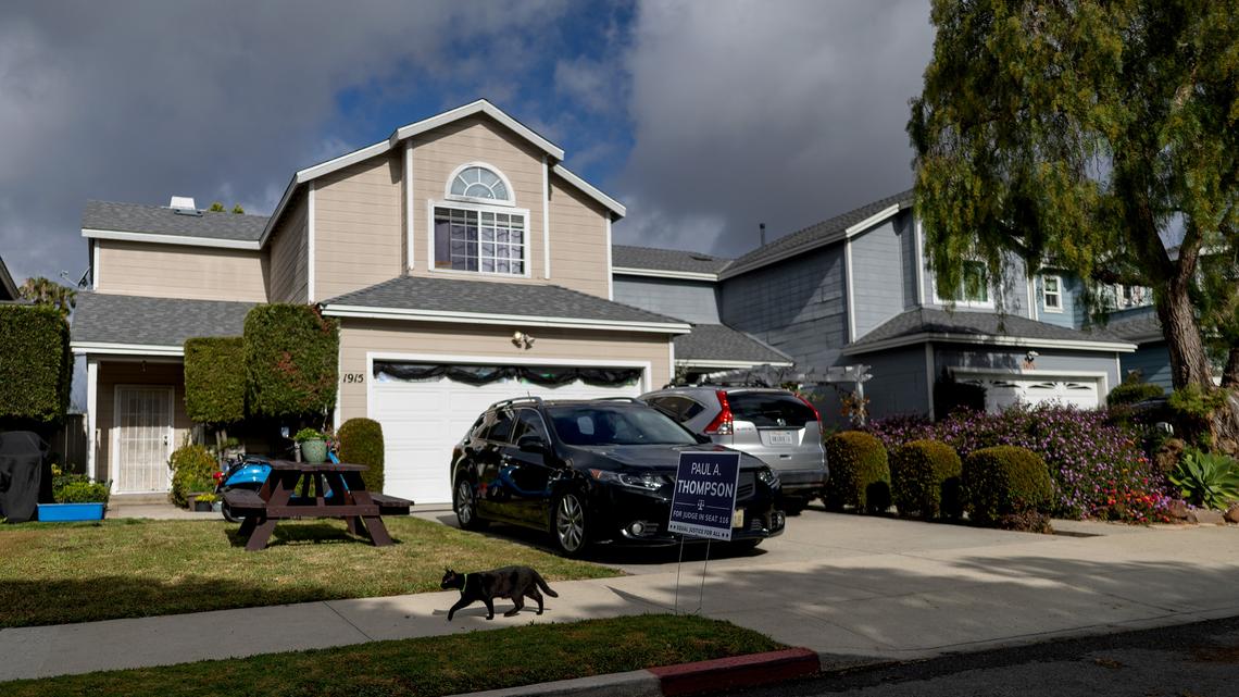 A cat walks in front of a home connected to Cole Tomas Allen, the shooting suspect at the White House Correspondents' Dinner, on Sunday, April 26, 2026, in Torrance, Calif. (Eric Thayer/Los Angeles Times/TNS)
