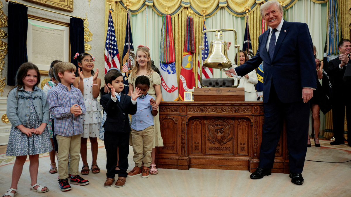 FILE PHOTO: U.S. President Donald Trump rings the opening bell for the New York Stock Exchange (NYSE) and Nasdaq during an event to mark the launch of "Trump Accounts" in the Oval Office at the White House in Washington, D.C., U.S., July 6, 2026. REUTERS/Evan Vucci/File Photo