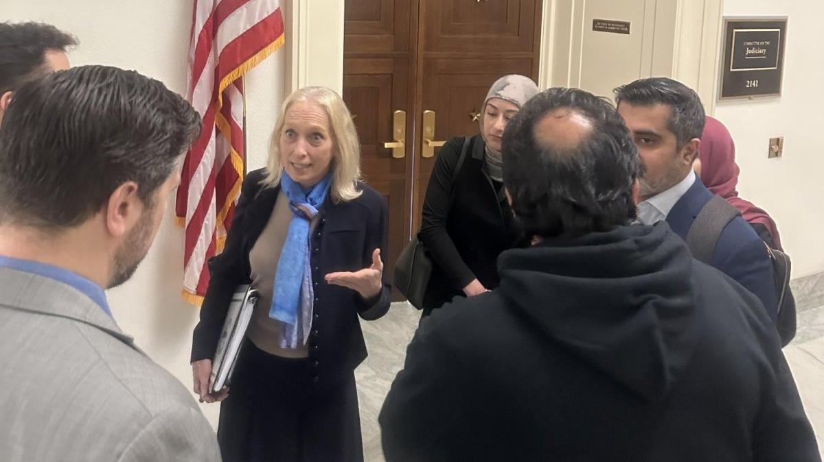 The top Democrat on the Constitution and Limited Government subcommittee, Rep. Mary Gay Scanlon, D-Pa., speaks with Muslim rights advocates after a hearing on Capitol Hill in Washington on Wednesday. Photo by Jacques Abou-Rizk/Medill News Service