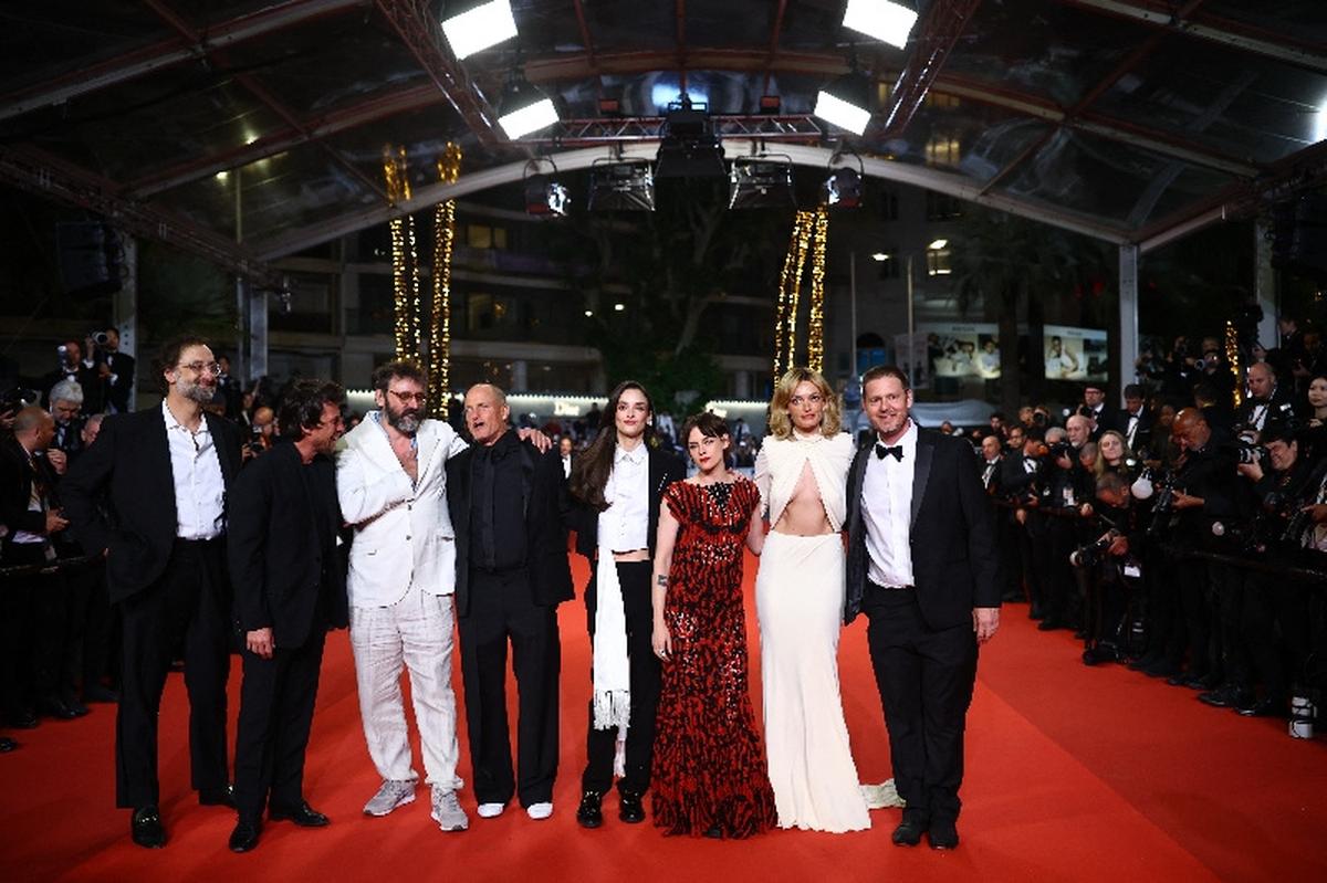 Director Quentin Dupieux and cast members Woody Harrelson, Tim Heidecker, Charlotte Le Bon, Kristen Stewart, Emma Mackey, Eric Wareheim pose on the red carpet during arrivals for the screening of the film "Full Phil" presented as part of Midnight Screenings at the 79th Cannes Film Festival in Cannes, France, May 17, 2026. REUTERS/Sarah Meyssonnier