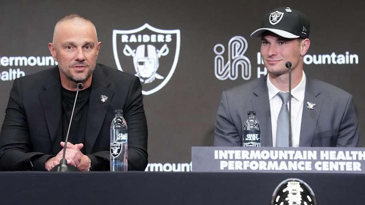  Apr 24, 2026; Henderson, NV, USA; Las Vegas Raiders quarterback Fernando Mendoza (right) and general manager John Spytek at introductory press conference at Intermountain Health Performance Center after being selected as the No. 1 pick in the 2026 NFL Draft. Mandatory Credit: Kirby Lee-Imagn Images | Kirby Lee-Imagn Images 