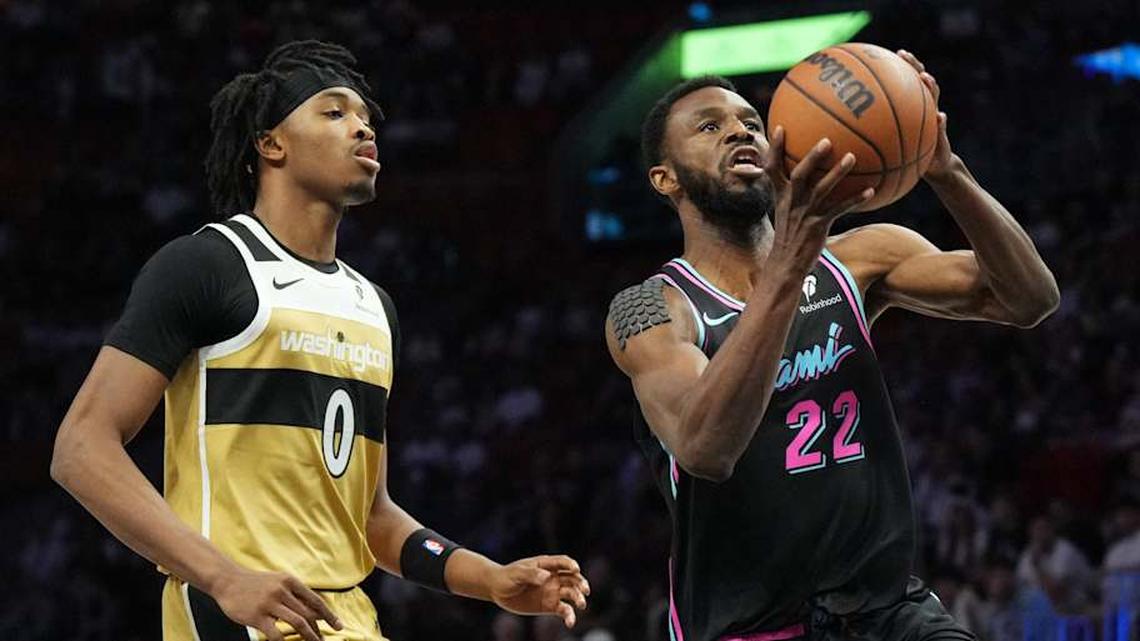  Apr 4, 2026; Miami, Florida, USA; Miami Heat forward Andrew Wiggins (22) goes up for a shot as Washington Wizards guard Bilal Coulibaly (0) defends during the first half at Kaseya Center. Mandatory Credit: Jim Rassol-Imagn Images | Jim Rassol-Imagn Images 