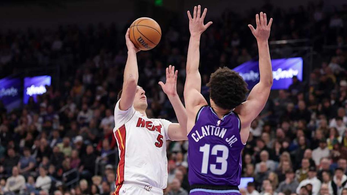  Jan 24, 2026; Salt Lake City, Utah, USA; Miami Heat forward Nikola Jović (5) shoots the ball over Utah Jazz guard Walter Clayton Jr. (13) during the second quarter at Delta Center. Mandatory Credit: Chris Nicoll-Imagn Images | Chris Nicoll-Imagn Images 