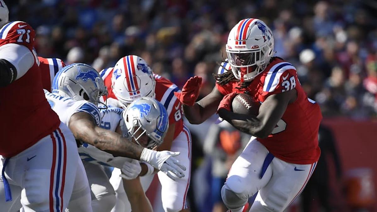  Oct 9, 2022; Foxborough, Massachusetts, USA; New England Patriots running back Rhamondre Stevenson (38) runs the ball during the first half against the Detroit Lions at Gillette Stadium. Mandatory Credit: Bob DeChiara-Imagn Images | Bob DeChiara-Imagn Images 