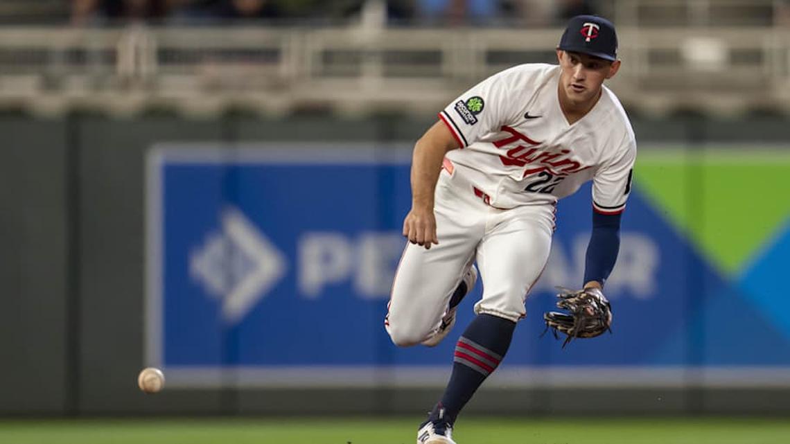  Minnesota Twins shortstop Brooks Lee (22) fields a ground ball against the Boston Red Sox in the sixth inning at Target Field. | Jesse Johnson-Imagn Images 