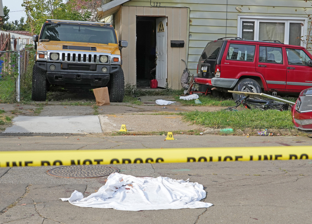 Nine people were killed in a shooting at 722 Perry St. in Erie on Oct. 9. Erie police investigators were on the scene Oct. 10.