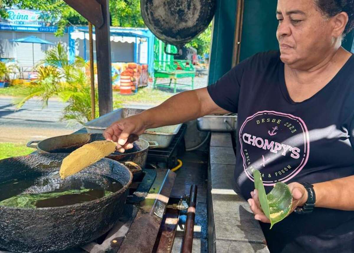  Making alcapurrias the traditional way, using a banana leaf. Photo credit: Heidi Gollub 