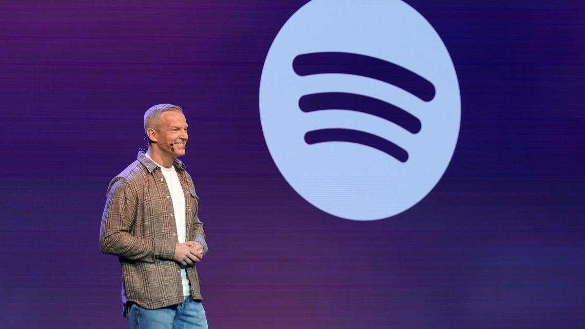 Put down your headphones. Spotify wants you to pick up an actual book 