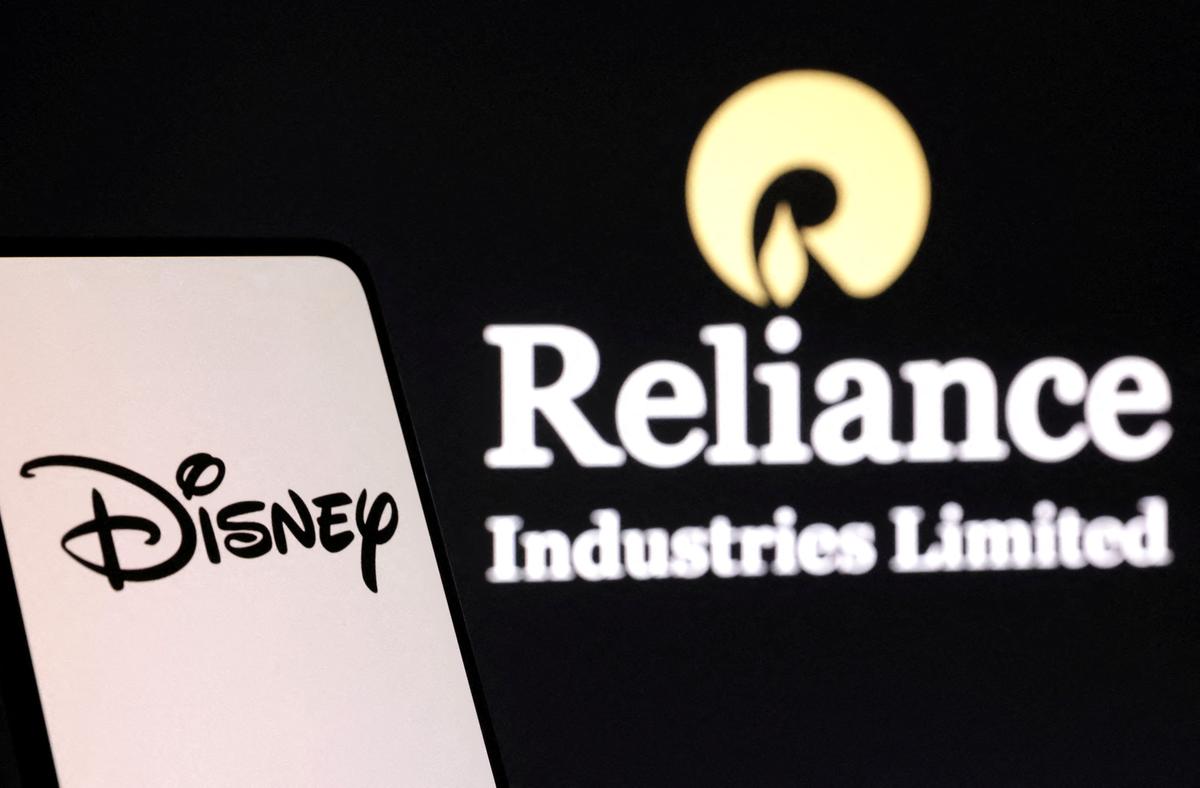 FILE PHOTO: Disney and Reliance logos are seen in this illustration taken, August 13, 2024. REUTERS/Dado Ruvic/Illustration/File Photo