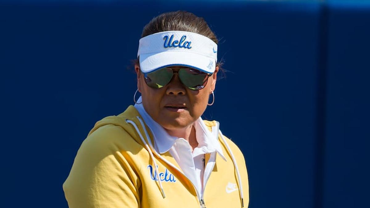  Jun 5, 2022; Oklahoma City, Oklahoma, USA; UCLA Bruins head coach Kelly Inouye-Perez heads back to the dugout during the sixth inning of the NCAA Women's College World Series game against the Florida Gators at USA Softball Hall of Fame Stadium. UCLA won 8-0. Mandatory Credit: Brett Rojo-Imagn Images | Brett Rojo-Imagn Images 