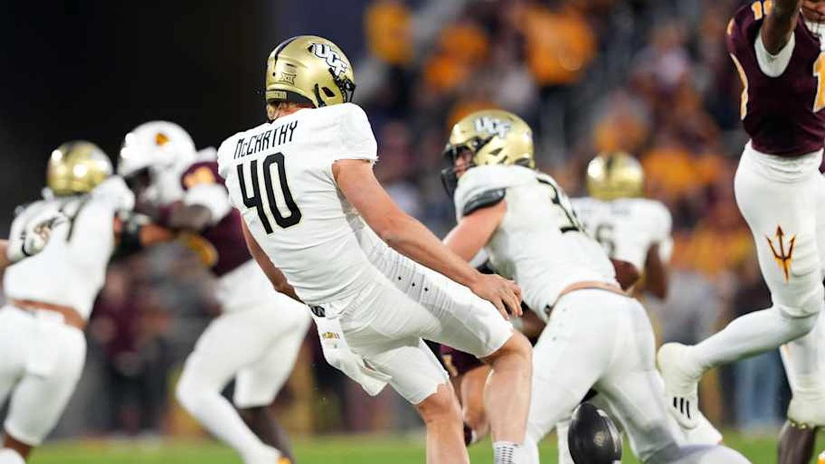  Nov 9, 2024; Tempe, Arizona, USA; Arizona State Sun Devils linebacker Martell Hughes (18) blocks a punt by UCF Knights punter Mitch McCarthy (40) during the first half at Mountain America Stadium, Home of the ASU Sun Devils. Mandatory Credit: Joe Camporeale-Imagn Images | Joe Camporeale-Imagn Images 