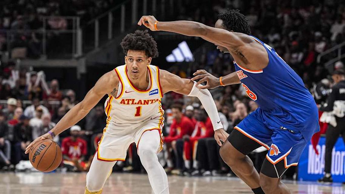  Apr 25, 2026; Atlanta, Georgia, USA; Atlanta Hawks forward Jalen Johnson (1) handles the ball guarded by New York Knicks forward Og Anunoby (8) during the second half during game four of the first round of the 2026 NBA Playoffs at State Farm Arena. Mandatory Credit: Dale Zanine-Imagn Images | Dale Zanine-Imagn Images 