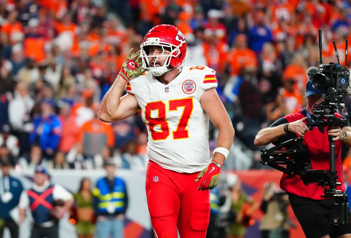  Kansas City Chiefs tight end Travis Kelce (87) reacts after his touchdown in the fourth quarter against the Denver Broncos at Empower Field at Mile High. Ron Chenoy-Imagn Images