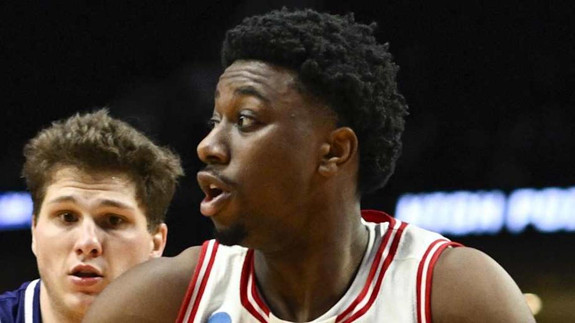  Mar 19, 2026; Portland, OR, USA; Wisconsin Badgers guard John Blackwell (25) drives to the basket against High Point Panthers guard Chase Johnston (99) during the second half of a first round game of the men's 2026 NCAA Tournament at Moda Center. Mandatory Credit: Troy Wayrynen-Imagn Images | Troy Wayrynen-Imagn Images 