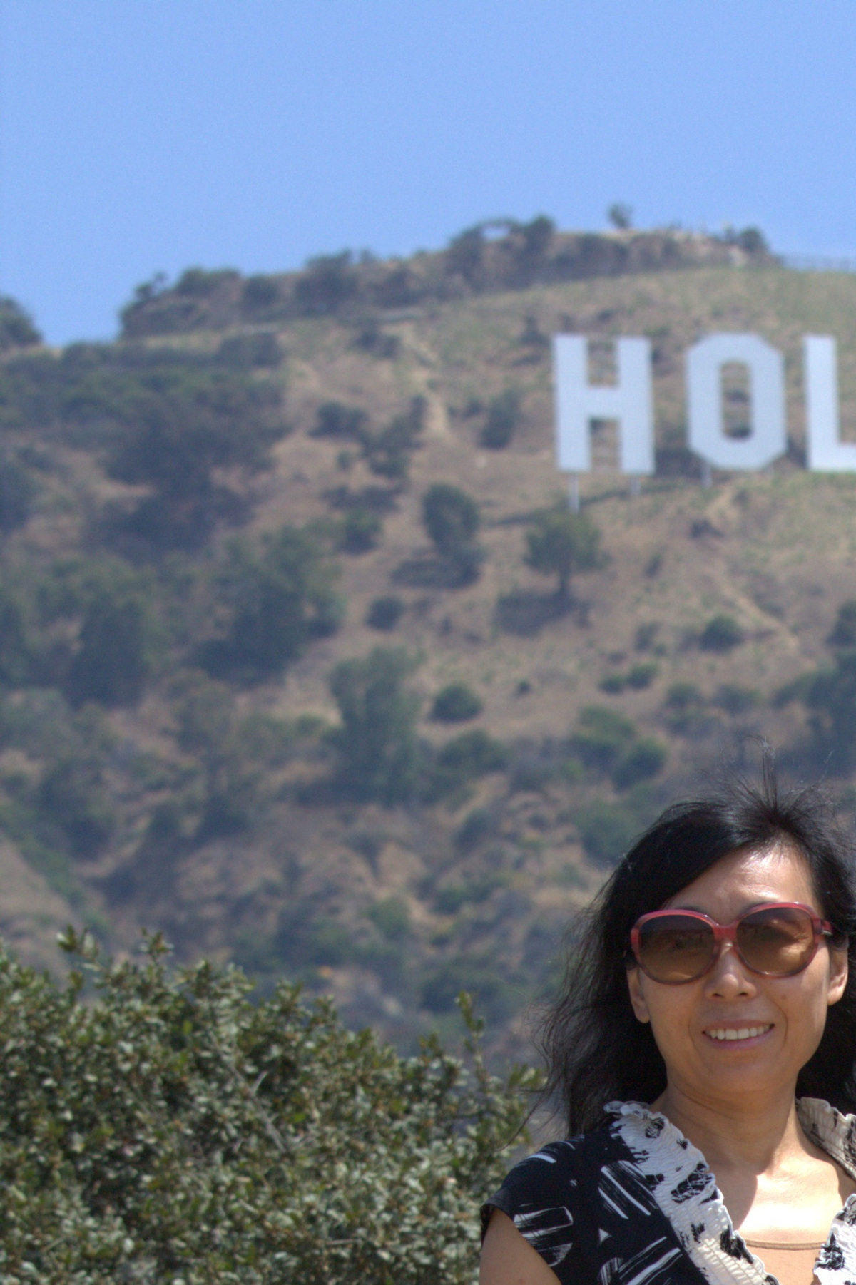 Dr. Yufang Rong and her husband Dr. Youlin Chen, an American seismologist held for nearly two years by China, pose together in Los Angeles, California, U.S., in this undated photograph provided on July 13, 2026. Courtesy Dr. Yufang Rong/Handout via REUTERS