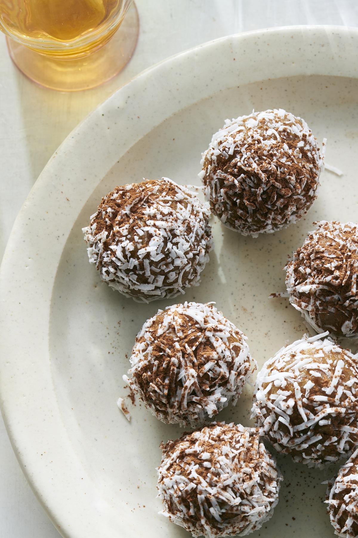Spiced walnut truffles. These easy truffles can be finished with a roll in coconut, a dusting of cocoa or both. Food styled by Hadas Smirnoff. (David Malosh/The New York Times)