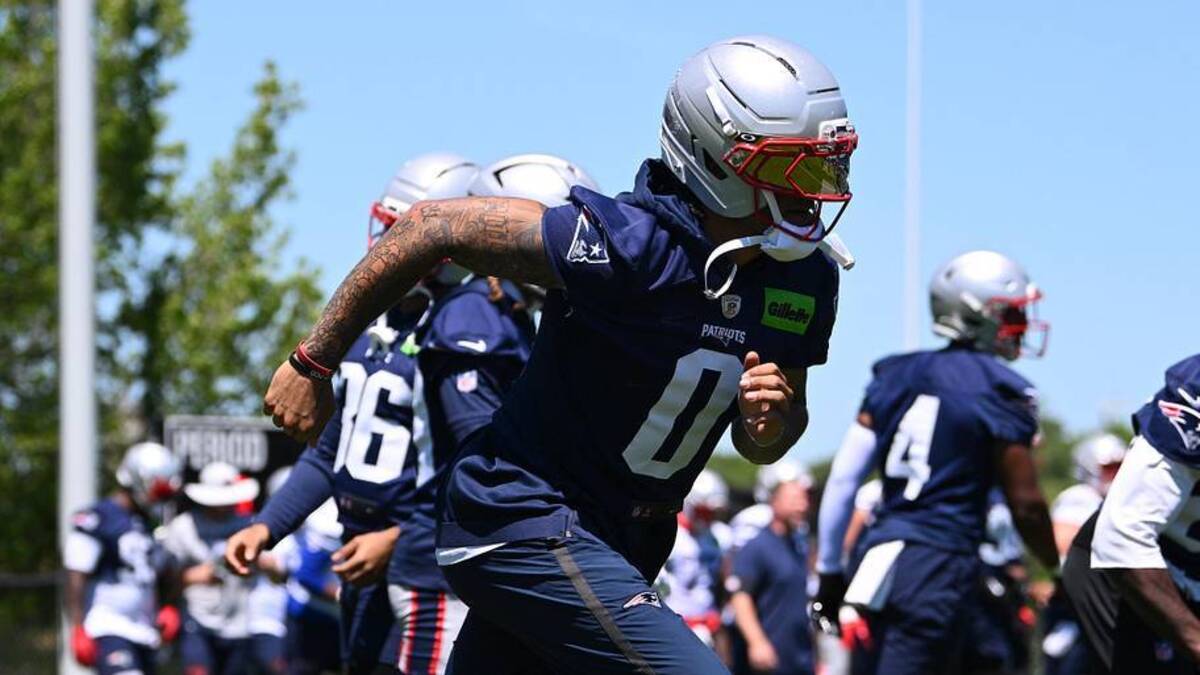  Jun 9, 2026; Foxborough, MA, USA; New England Patriots cornerback Christian Gonzalez (0) warms up during minicamp at Gillette Stadium. Mandatory Credit: Eric Canha-Imagn Images | Eric Canha-Imagn Images 