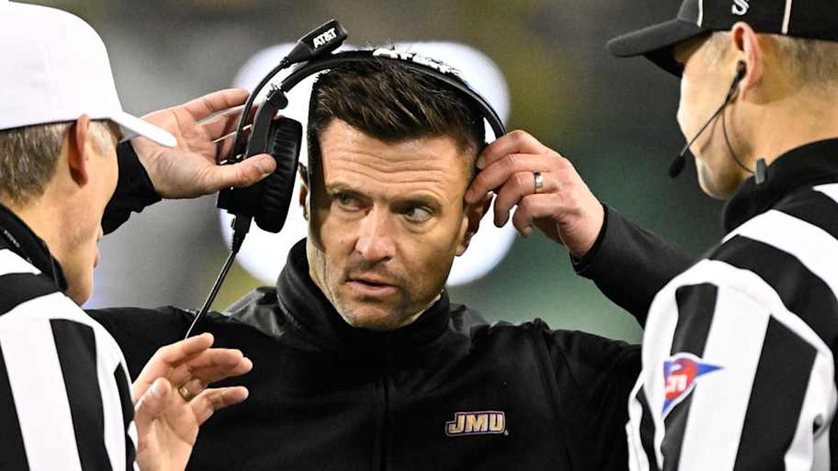  Dec 20, 2025; Eugene, OR, USA; James Madison Dukes head coach Bob Chesney speaks with the referees during the fourth quarter against the Oregon Ducks at Autzen Stadium. Mandatory Credit: Troy Wayrynen-Imagn Images | Troy Wayrynen-Imagn Images 