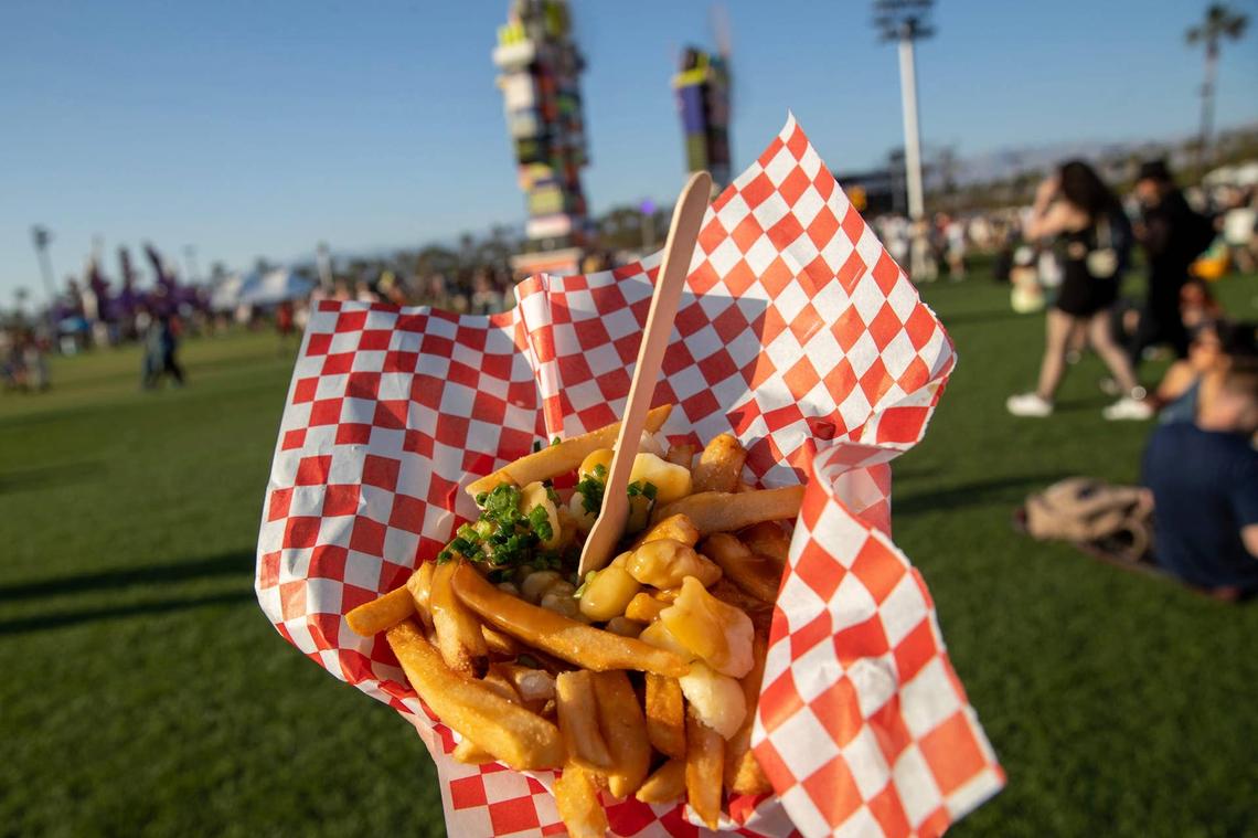  The classic fries with cheese curds, brown gravy and chives from Poutine Brothers during the Coachella Valley Music and Arts Festival in Indio, Calif., on Friday, April 14, 2023. 