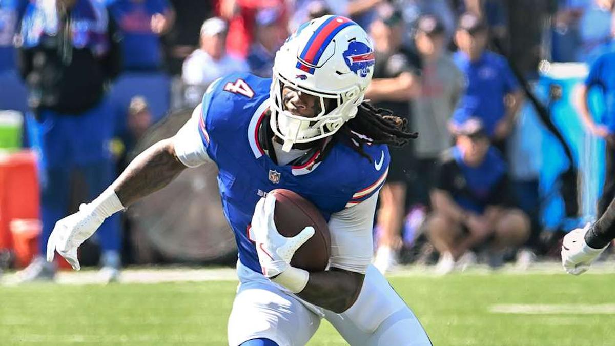 Sep 28, 2025; Orchard Park, New York, USA; Buffalo Bills running back James Cook (4) carries the ball against the New Orleans Saints in the first quarter at Highmark Stadium. 