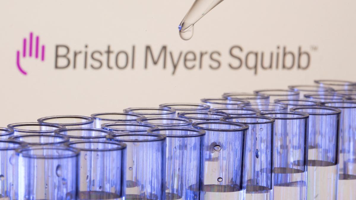FILE PHOTO: Test tubes are seen in front of a displayed Bristol Myers Squibb logo in this illustration taken, May 21, 2021. REUTERS/Dado Ruvic/Illustration/File Photo