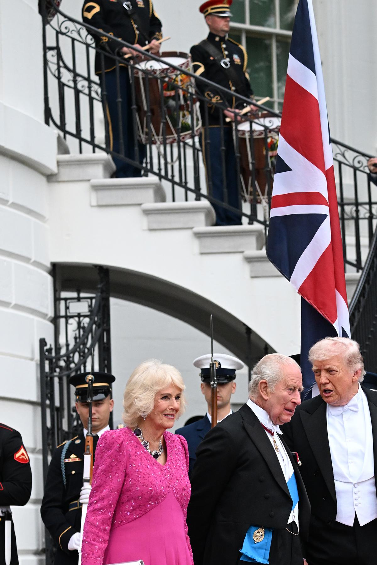 President Donald Trump and first lady Melania Trump, right, greet King Charles III and Queen Camilla of the United Kingdom as they arrive for a state dinner at the White House in Washington, on Tuesday, April 28, 2026. (Kenny Holston/The New York Times)